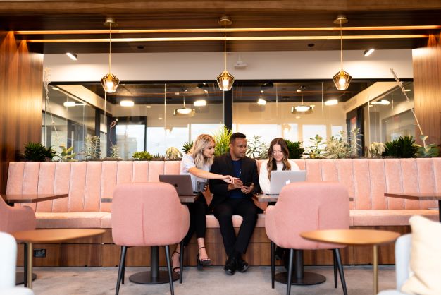 3 people working together