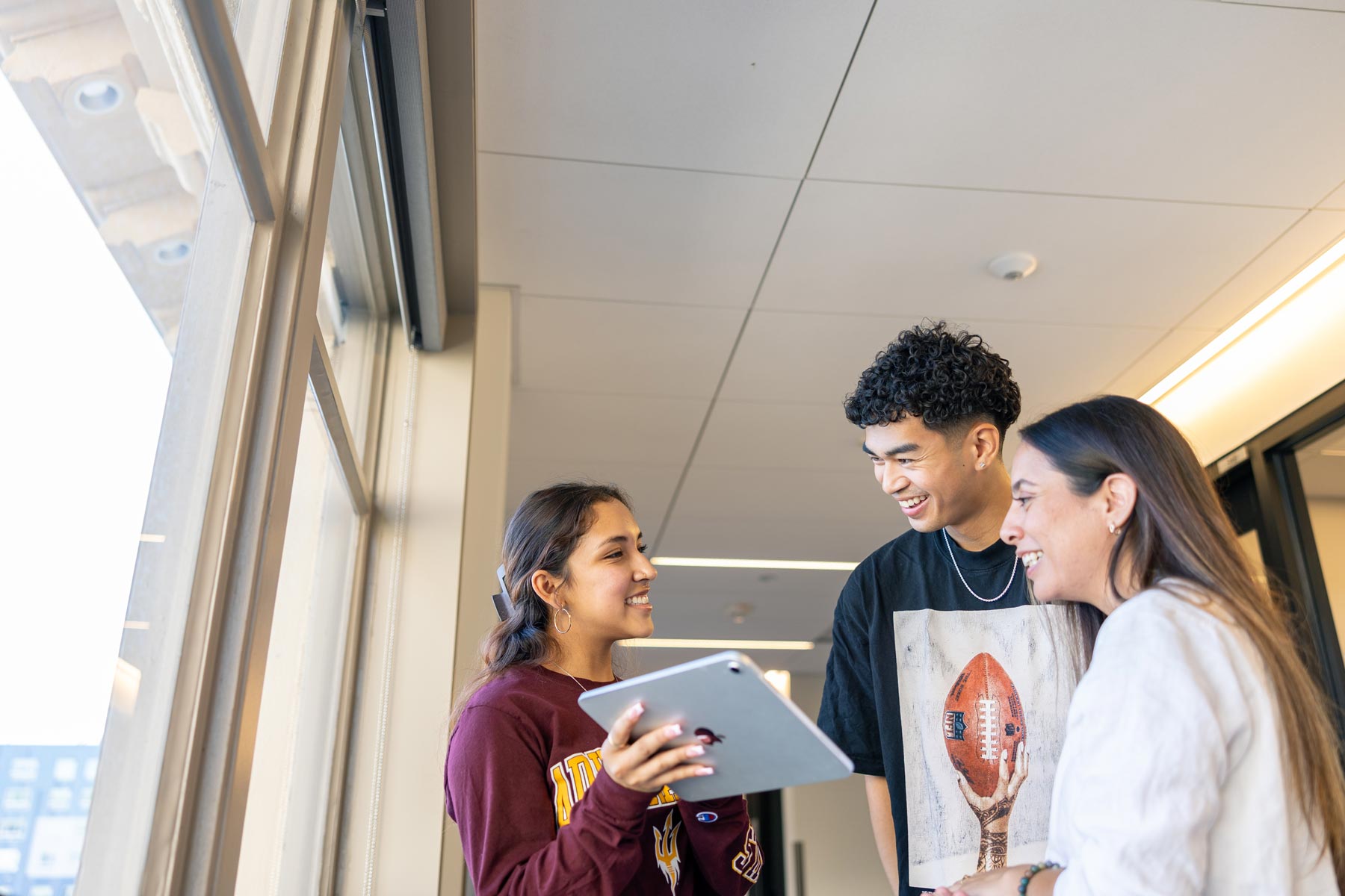 three students collaborating 