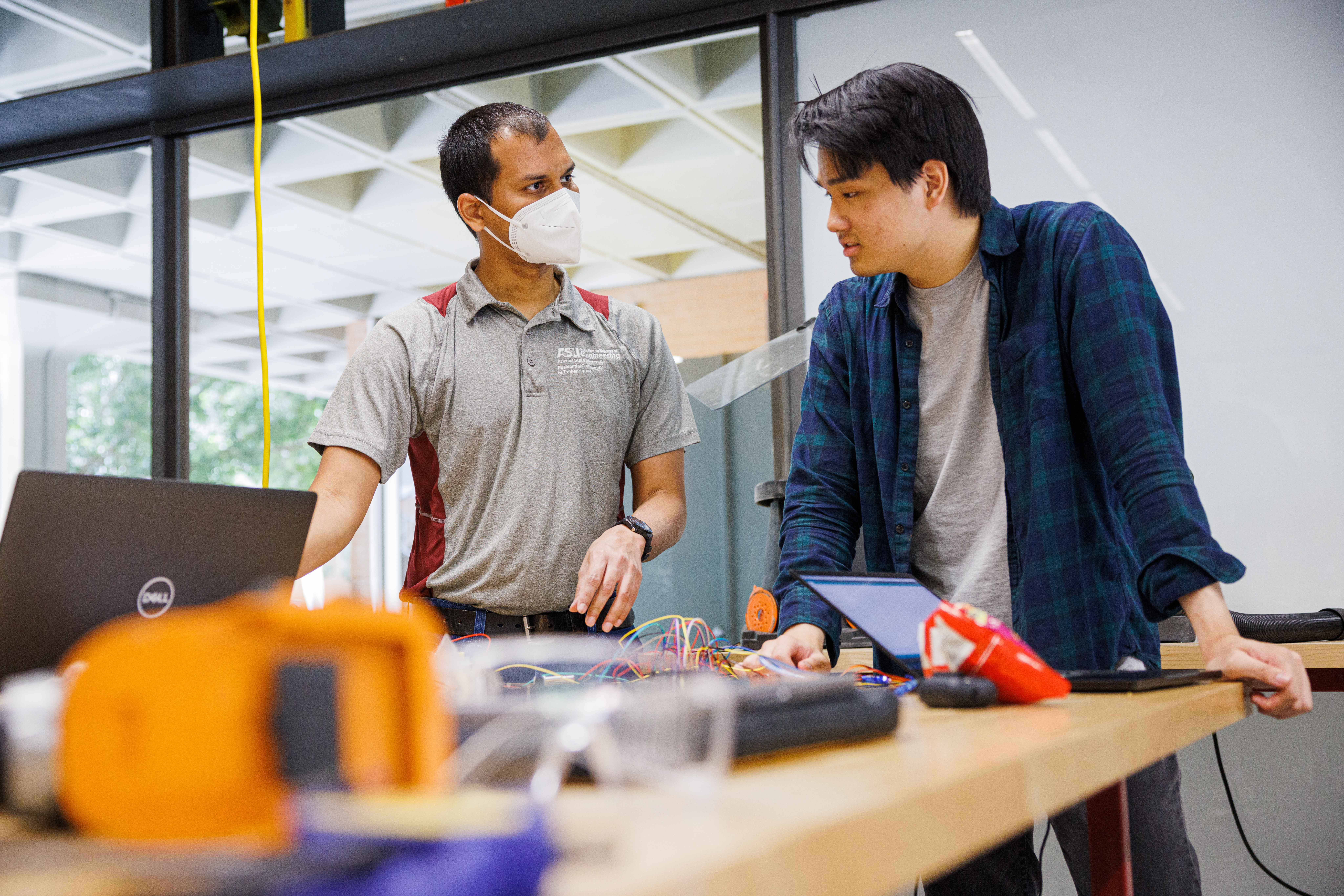 Supervisor and student in lab