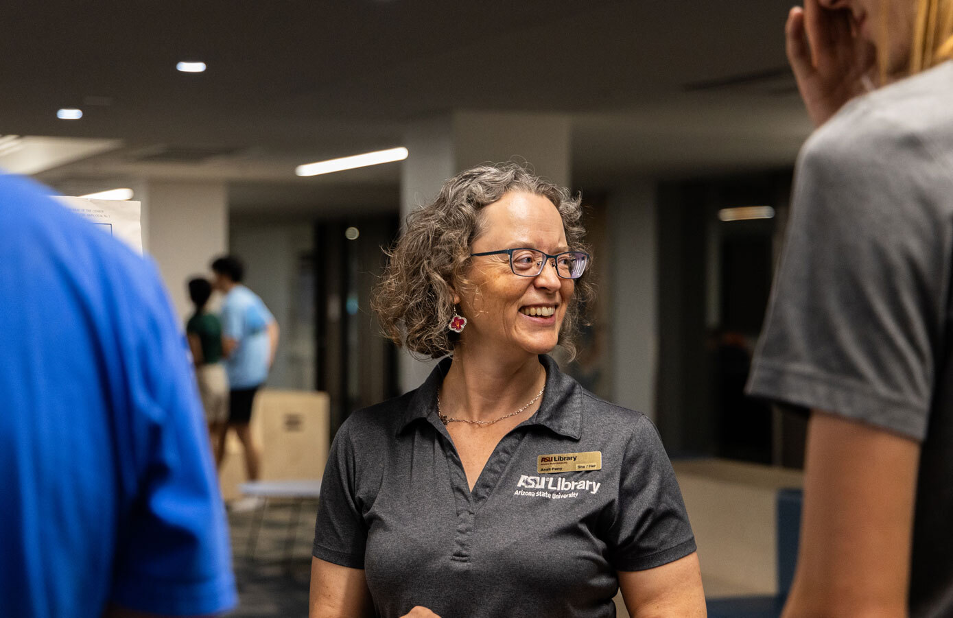 Women in ASU shirt